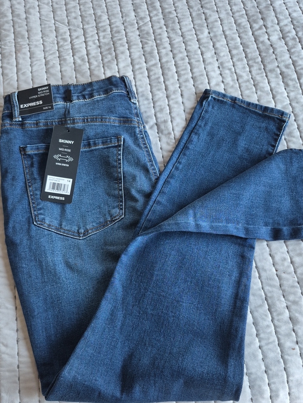 Express Skinny Jeans - Medium Blue Denim
